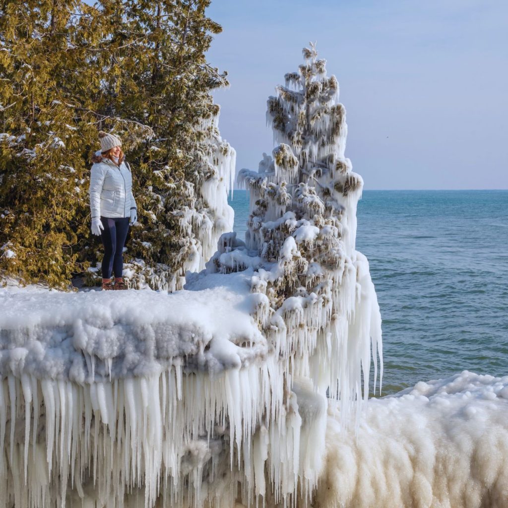 door county, wisconsin, with ice formations around the cliff